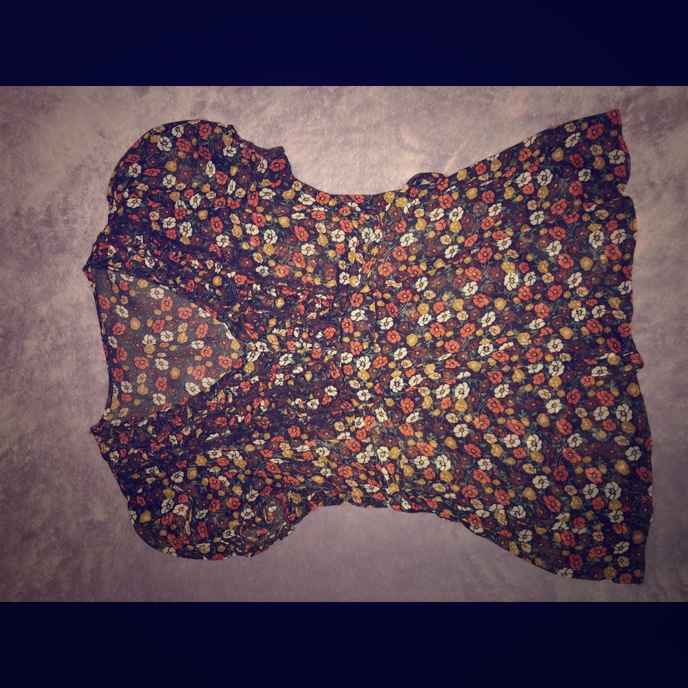 Sheer blouse. Lightly worn.